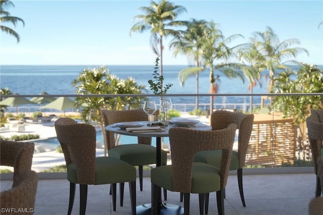 balcony featuring a water view