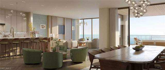 dining area with a water view, a wealth of natural light, sink, and dark parquet flooring