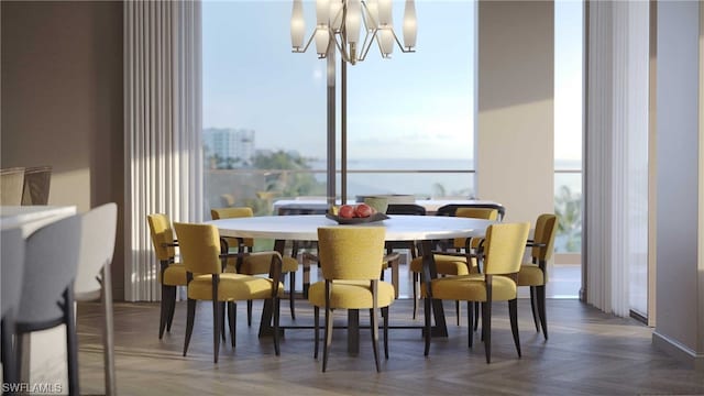 dining room featuring an inviting chandelier and dark parquet floors