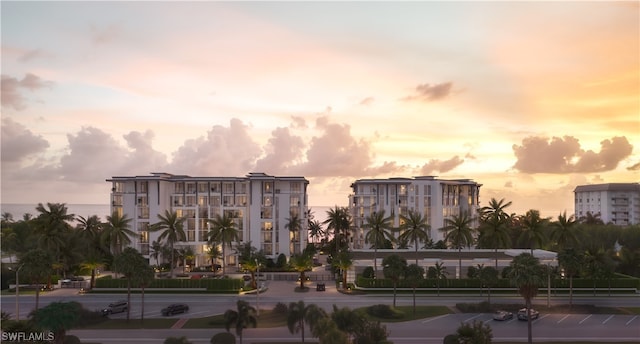 view of outdoor building at dusk