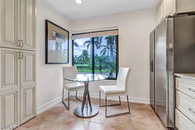 view of tiled dining space