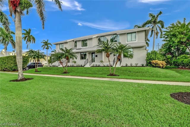 view of front of house with a front lawn