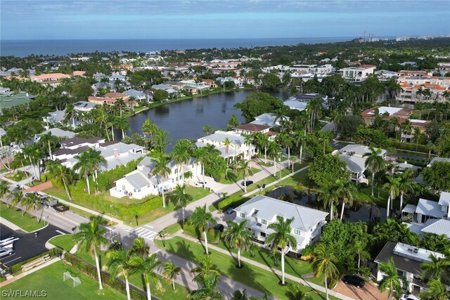 drone / aerial view with a water view