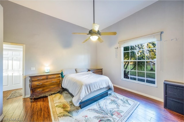 bedroom featuring high vaulted ceiling, ceiling fan, and dark hardwood / wood-style flooring