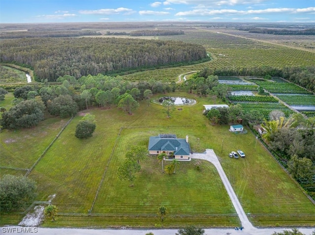 birds eye view of property featuring a rural view