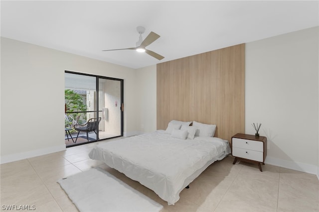 tiled bedroom with ceiling fan and access to exterior