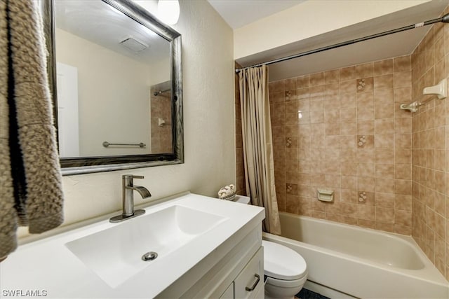 full bathroom with vanity, toilet, and shower / tub combo with curtain