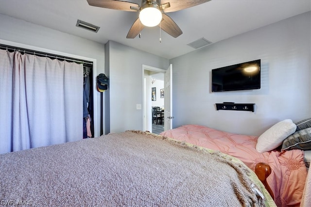 bedroom featuring a closet and ceiling fan