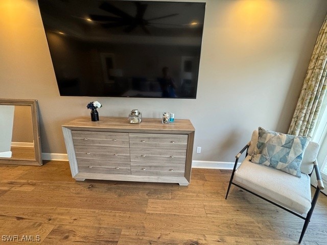 sitting room with hardwood / wood-style floors