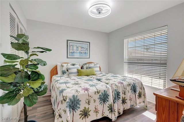 bedroom featuring hardwood / wood-style flooring