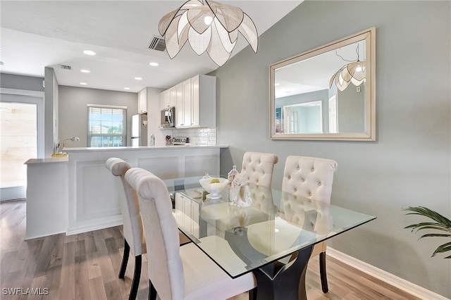 dining area featuring light hardwood / wood-style flooring