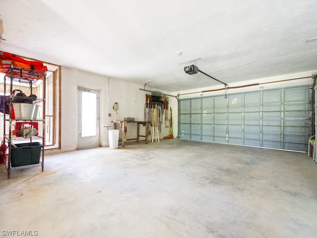 garage featuring a garage door opener