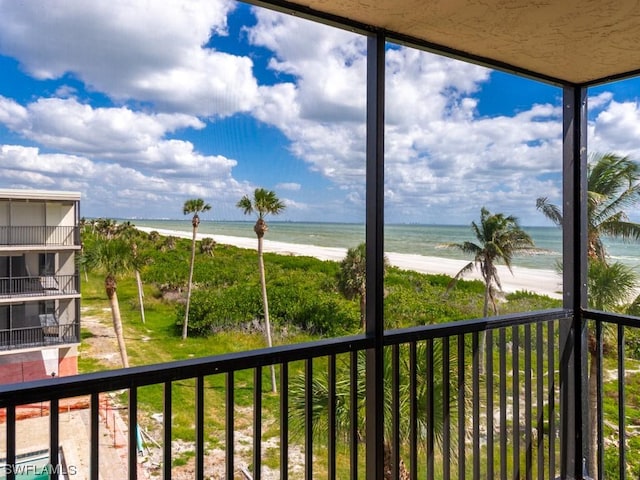 property view of water featuring a beach view