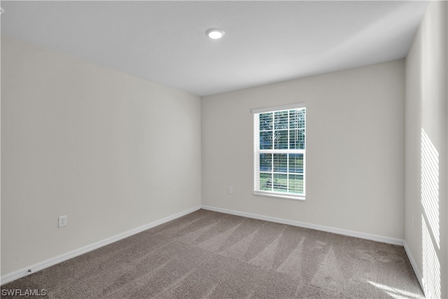 view of carpeted spare room