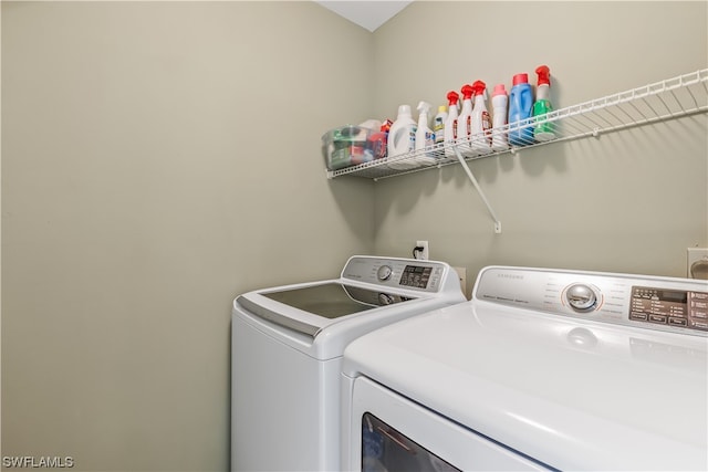 laundry area featuring separate washer and dryer