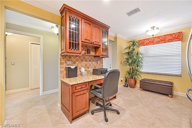 office featuring crown molding and light tile patterned flooring