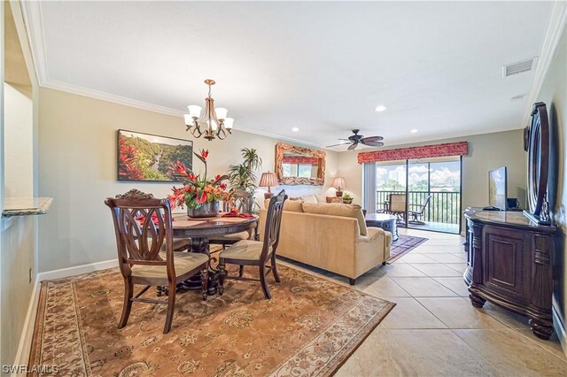 tiled dining area featuring ceiling fan with notable chandelier and ornamental molding