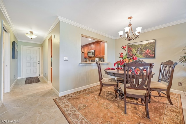 dining area with an inviting chandelier and crown molding