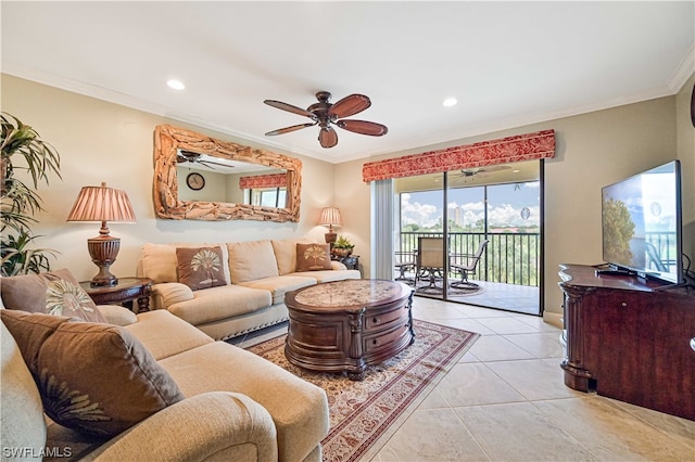 living room featuring ceiling fan, ornamental molding, and light tile patterned floors