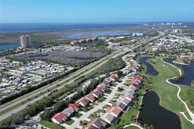 bird's eye view with a water view