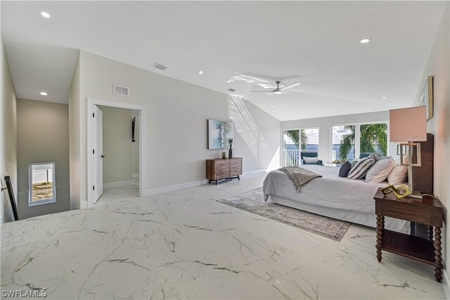 bedroom with ensuite bath, ceiling fan, and vaulted ceiling