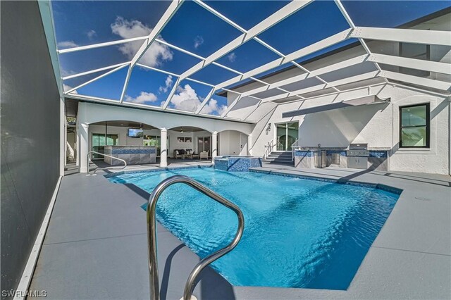 view of swimming pool featuring a lanai, a patio area, ceiling fan, and area for grilling