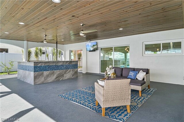 view of patio / terrace with ceiling fan and an outdoor hangout area