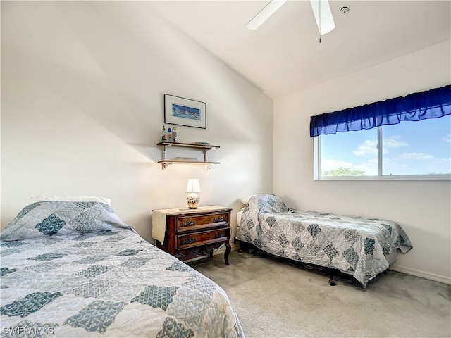 carpeted bedroom with lofted ceiling and ceiling fan