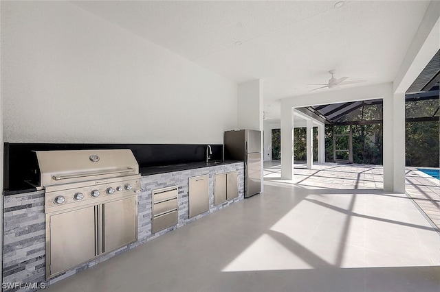 view of terrace featuring ceiling fan, a swimming pool, an outdoor kitchen, area for grilling, and glass enclosure