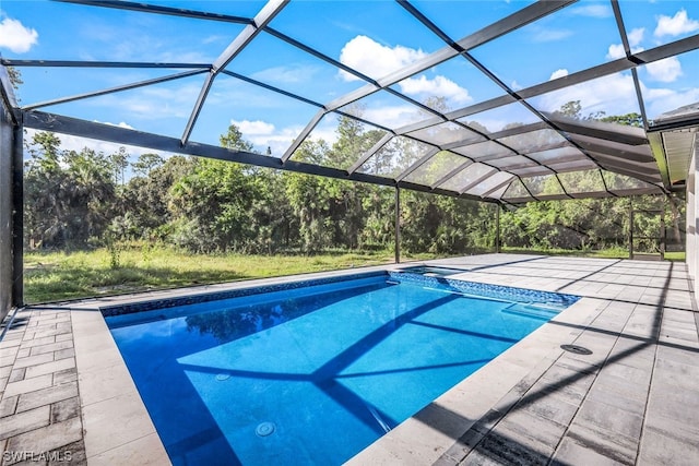 view of pool featuring a lanai