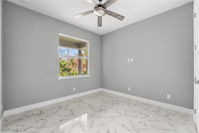 spare room featuring ceiling fan