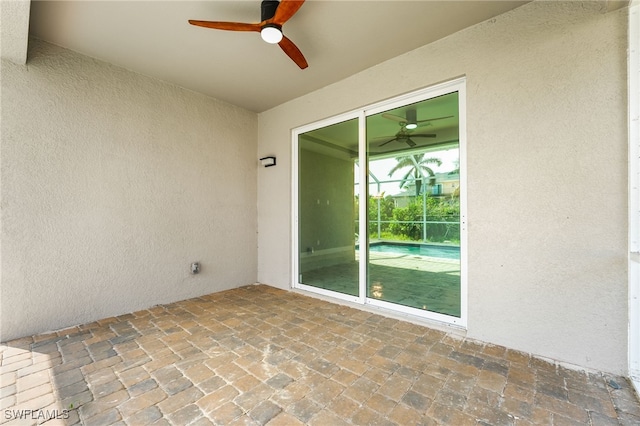 view of patio with ceiling fan