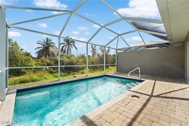 view of pool featuring a patio and a lanai