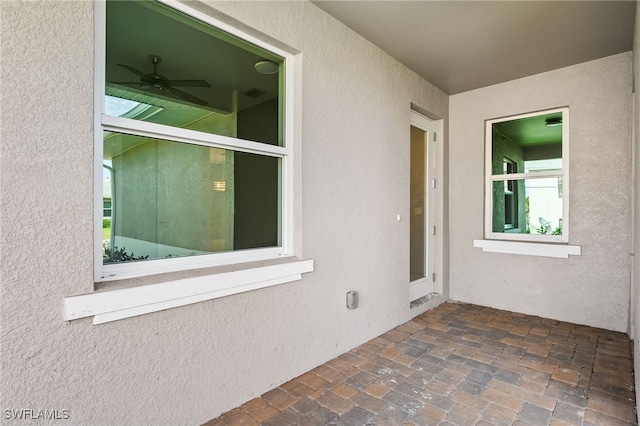 view of patio with ceiling fan