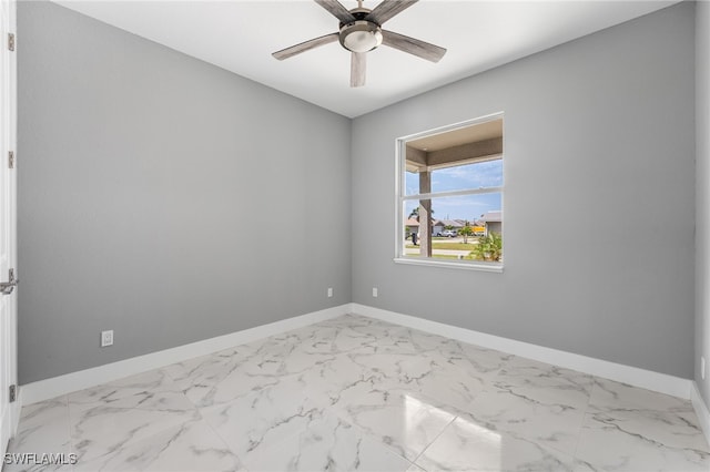 spare room featuring ceiling fan