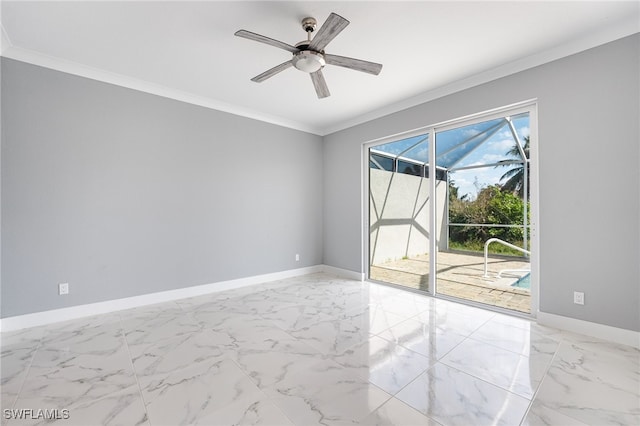 empty room featuring crown molding and ceiling fan