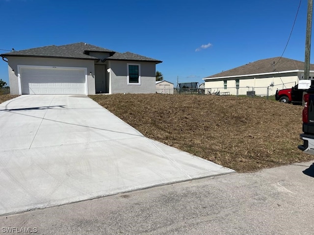 view of front of home featuring a garage