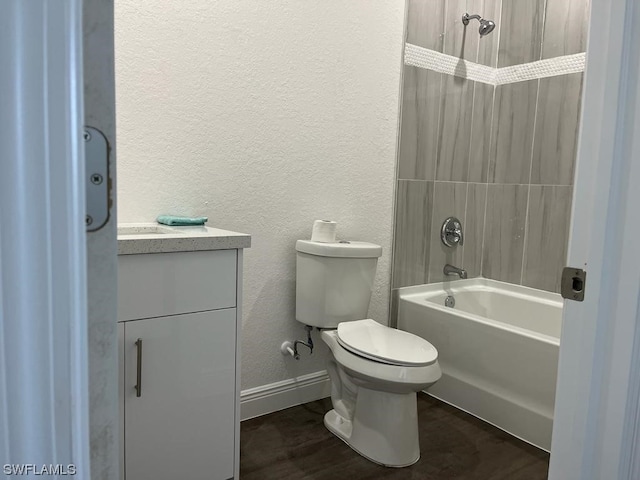 full bathroom featuring vanity,  shower combination, and toilet