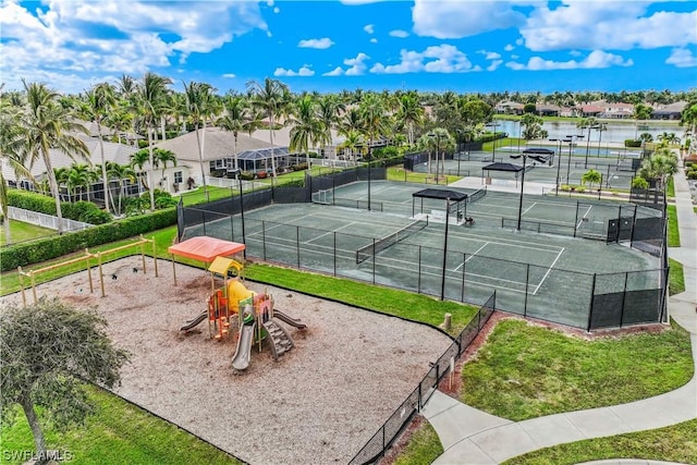 view of sport court with a playground