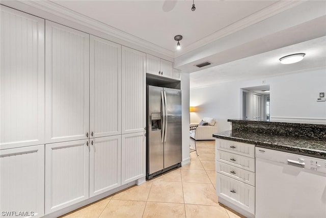 kitchen featuring stainless steel refrigerator with ice dispenser, white cabinetry, ornamental molding, dishwasher, and dark stone counters