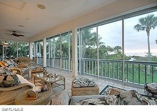 sunroom / solarium with ceiling fan