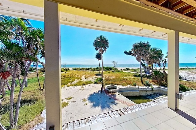 view of patio featuring a water view