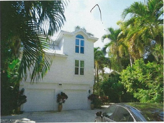 view of home's exterior featuring a garage