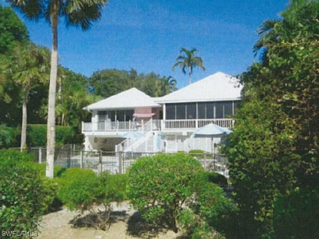 exterior space with a fenced in pool