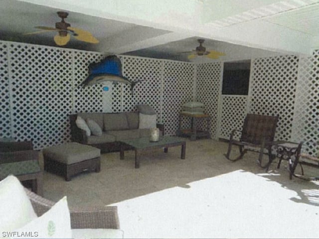 living room with ceiling fan