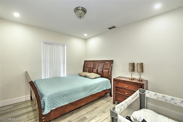 bedroom featuring light hardwood / wood-style floors