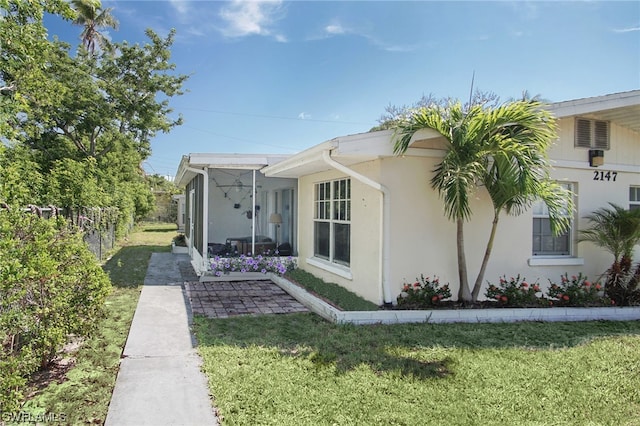 2147 Washington Ave, Naples, FL 34112 - exterior space featuring a front yard