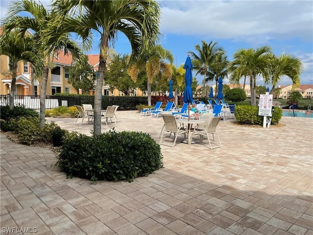 view of patio with a community pool