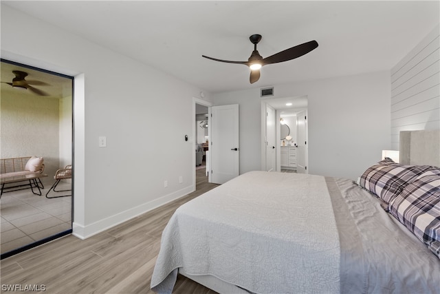 bedroom with light hardwood / wood-style floors and ceiling fan