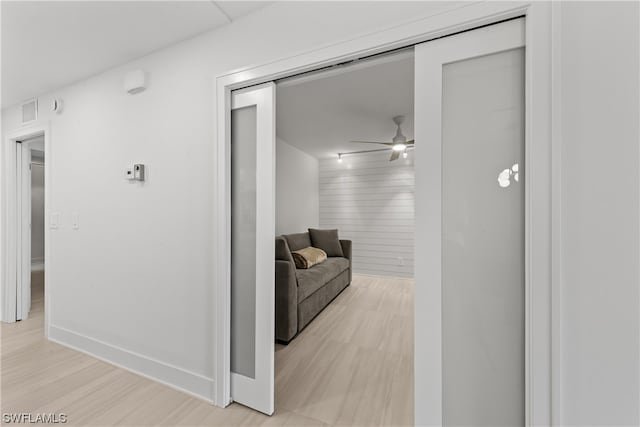 hall featuring light hardwood / wood-style floors